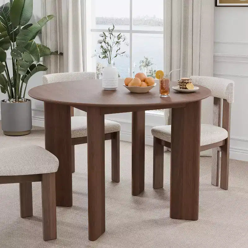 Tavolo da pranzo rotondo in legno marrone per 4 persone, con base a 4 gambe