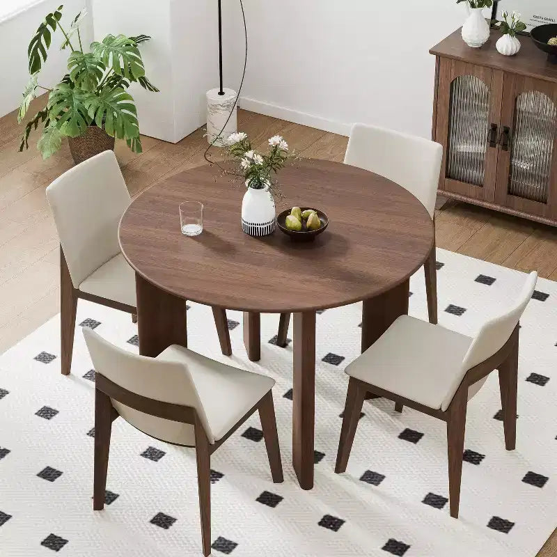 Tavolo da pranzo rotondo in legno marrone per 4 persone, con base a 4 gambe